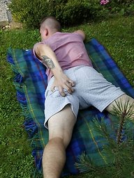 Joshua Czech lays a blanket down outside and busts a nut.
